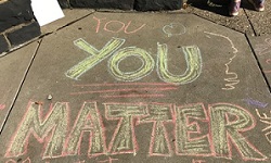 You Matter written on sidewalk in chalk