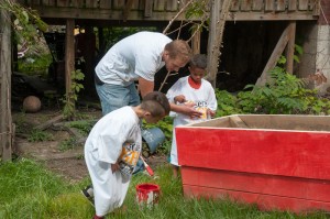 AUUC Volunteers help build NCM Food Pantry Garden 