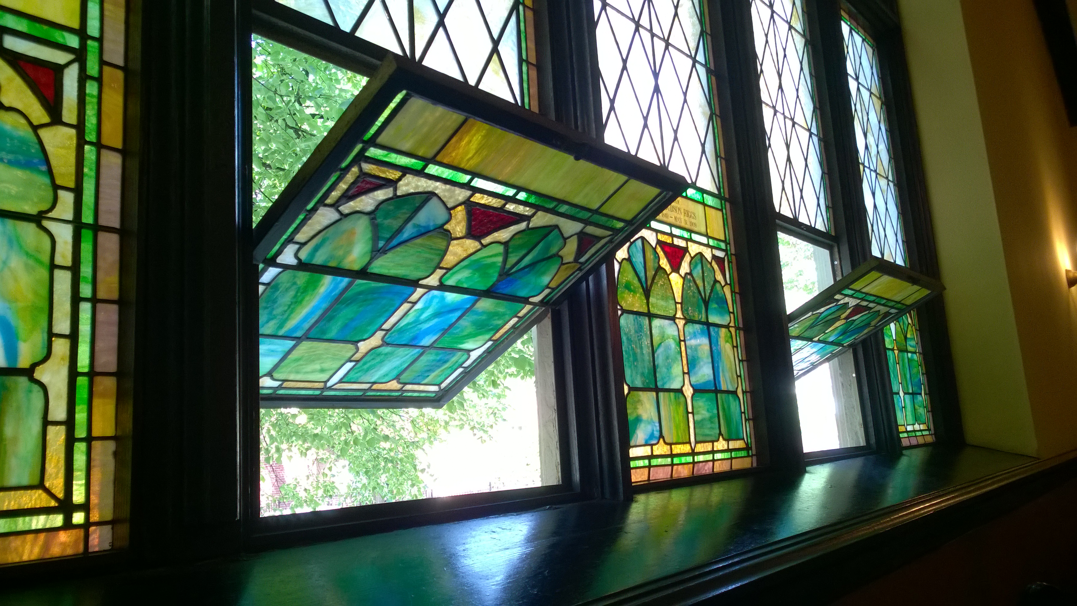 stained glass windows tilted open