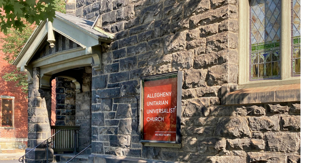 Exterior image of church with welcome sign